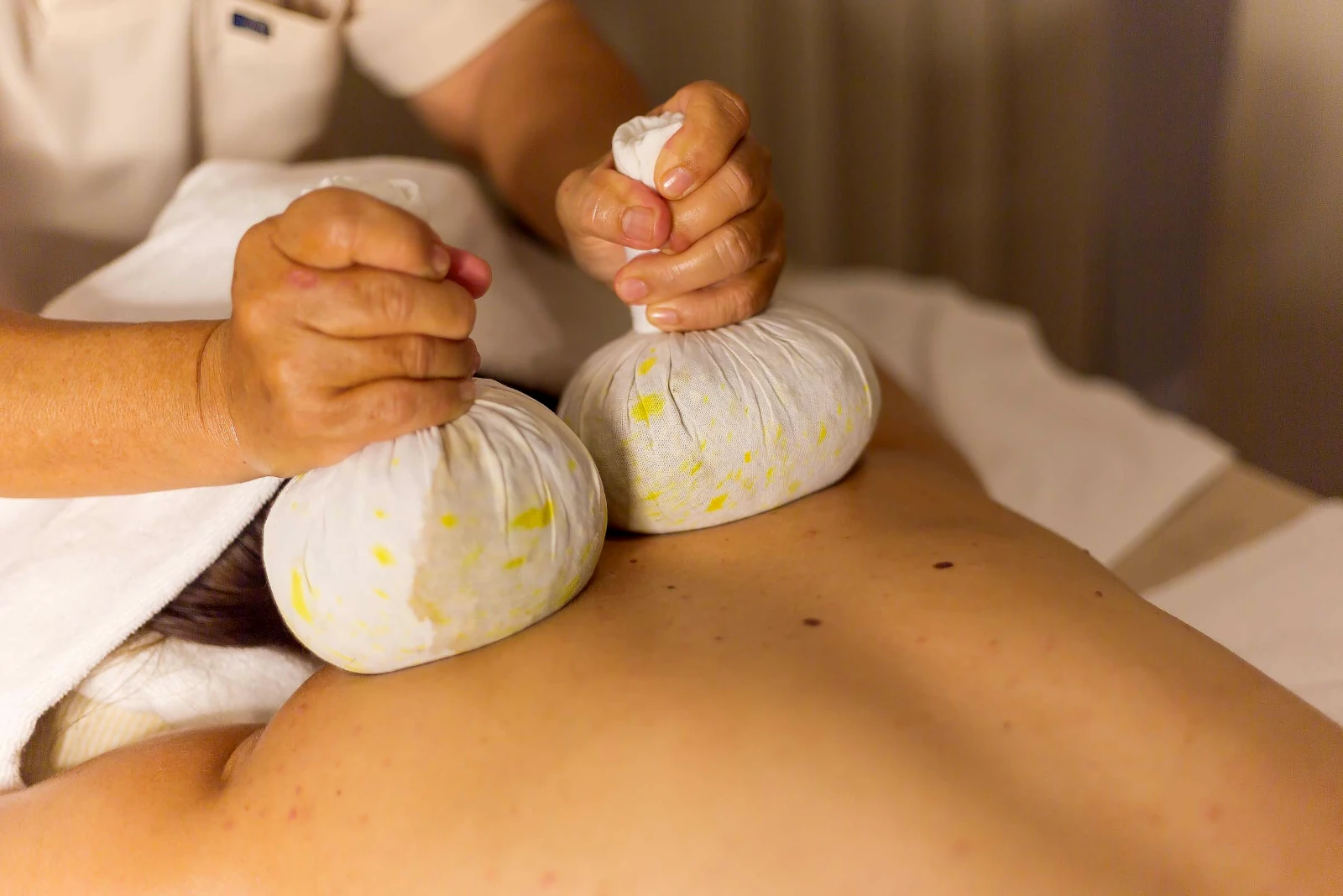 Hot Herbal Compress Massage in Bang Tao, Phuket at Namm Massage boutique studio